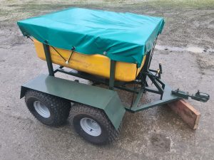 A trailer game bird feeder for use behind a quad bike or similar