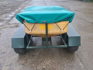 A trailer game bird feeder for use behind a quad bike or similar